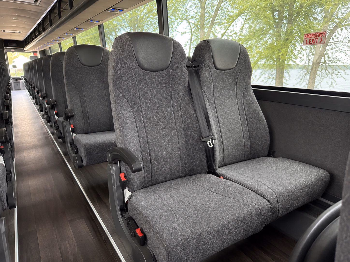 how distance and duration affect charter bus rates in bentonville arkansas